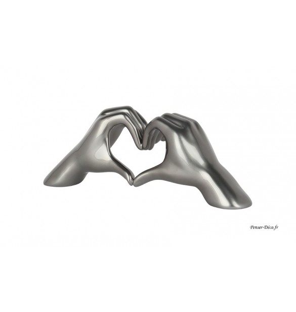 Sculpture argentée, main cœur, H.16 cm Sculpture argentée, main cœur, H.16 cm