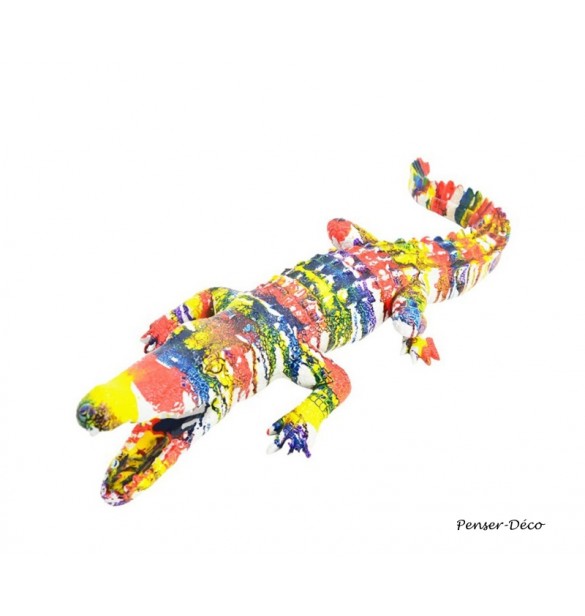 Apportez une touche décalée à votre décoration intérieure avec cette sculpture originale d'un crocodile coloré, Penser-Déco.fr